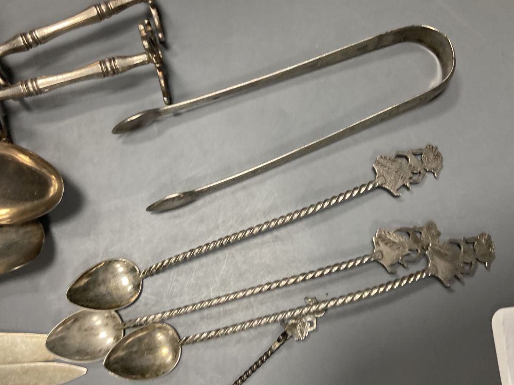 Six pairs of George V mother of pearl handled silver fruit eaters, Sheffield, 1933, etc.
